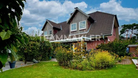 Terrassenansicht - Haus kaufen in Quickborn - Schöner Wohnen: Wunderschöne Doppelhaushälfte mit zauberhaftem Garten in Traumlage