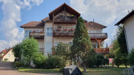 Ansicht - Wohnung kaufen in Rudolstadt - Charmante 2-Raum-Eigentumswohnung im Souterrain mit Terrasse und Parkplatz