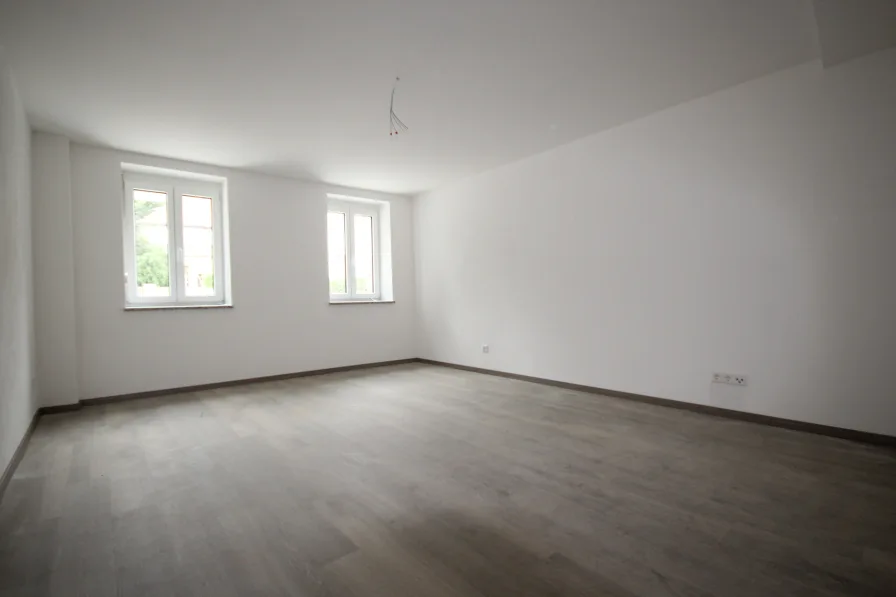 Wohnzimmer - Wohnung kaufen in Schrobenhausen - Katip | Moderne 2,5-ZKB Erdgeschosswohnung in Schrobenhausen *top ausgestattet