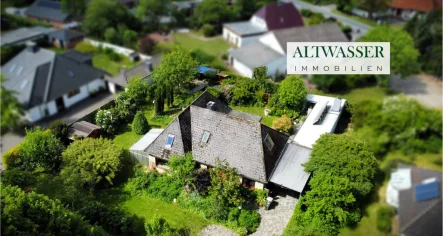 Luftaufnahme - Haus kaufen in Lindewitt - Lindewitt: Haus am See mit Einliegerwohnung