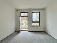 Wohnzimmer mit Balkon