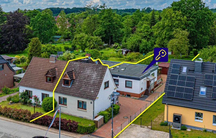Zwei Immobilien in Einem - Haus kaufen in Kiel / Siedlung Oppendorf - Zwei Wohneinheiten auf großem Grundstück in Kiel Oppendorf