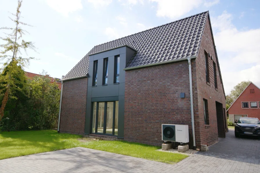 619 Titelbild - Haus kaufen in Westerstede - Top-Energieausweis!! Neubau-Reihenendhaus mit 2 KFZ-Stellplätzen in ruhiger Wohnlage von Westerstede