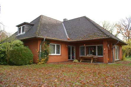 664 Titelbild - Haus kaufen in Westerstede / Hollwege - Geräumiges Einfamilienhaus auf großem Grundstück in Hollwege