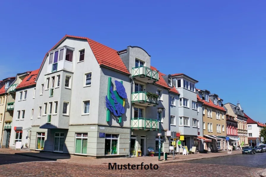 Keine Originalbilder - Haus kaufen in Liebenburg - Mehrfamilienhaus mit 3 Reihengaragen - provisionsfrei