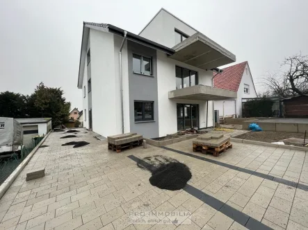 Bild aus der Bauphase - Wohnung kaufen in Bielefeld / Ubbedissen - Neubau 2-ZKB KfW Effizienzhaus 55 in familiengerechtem MFH mit 4WE (DG / mit einer Wohnfläche von ca. 75 m² )