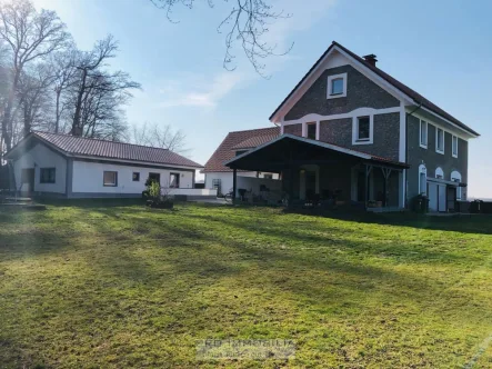 2 - Haus kaufen in Werther - Stilsicher kernsaniertes Bruchsteinhaus KfW-55 inkl. Gartenhaus Lagerraum Garagen (Energieklasse A)