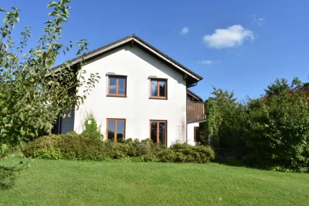 Einfamilienhaus - Haus kaufen in Hillesheim - **Stilvolles Architektenhaus mit großem Grundstück, einzigartigem Weitblick, Carport und Garage**