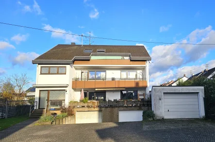 Vorderansicht - Haus kaufen in Rehlingen-Siersburg - Gepflegtes 3 Parteienhaus in guter Wohnlage von Rehlingen-Siersburg, OT Rehlingen