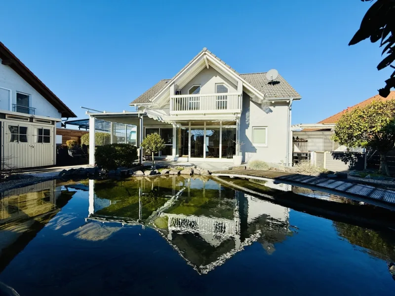 Titelbild - Haus kaufen in Biblis - + Einfamilienhaus zum Verlieben schön +