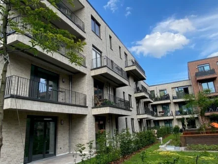 Balkonseite H 1.jpg - Wohnung mieten in Lübeck - Charmante Erdgeschosswohnung mit großer Terrasse