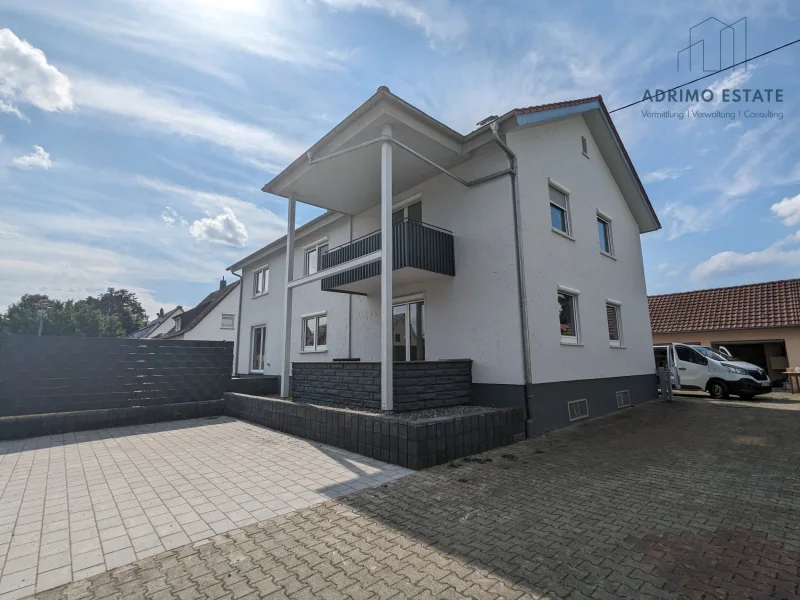 Ansicht - Wohnung mieten in Burgrieden - Moderne 3-Zimmer-Wohnung mit Balkon und Stellplätzen - Erstbezug nach Sanierung