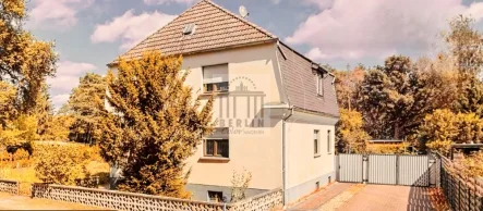 Frontansicht  - Haus kaufen in Milower Land - Idyllisches Grundstück mit 1.844 qm inkl. EFH –  Garten, Garage, Terrasse & Nebengebäude in Milow!