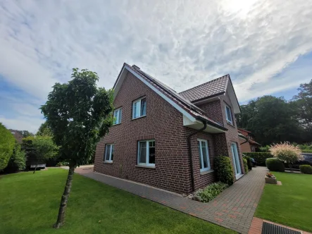 Westseite - Haus kaufen in Ostbevern - Hier wollen Sie wohnen! Tolles Familienhaus ++ Erdwärmepumpe ++ PV-Anlage ++  Top-Zustand