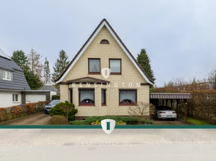 Vorderansicht - Haus kaufen in Lübeck - EFH mit großem Grundstück, Wintergarten, 2 Garagen in Uninähe