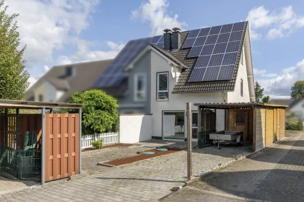 Hausansicht - Haus kaufen in Unna - Bezugsfertige Doppelhaushälfte in Unna-Mühlhausen – Perfekt für die kleine Familie