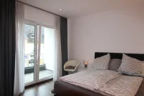 Schlafzimmer mit Balkon