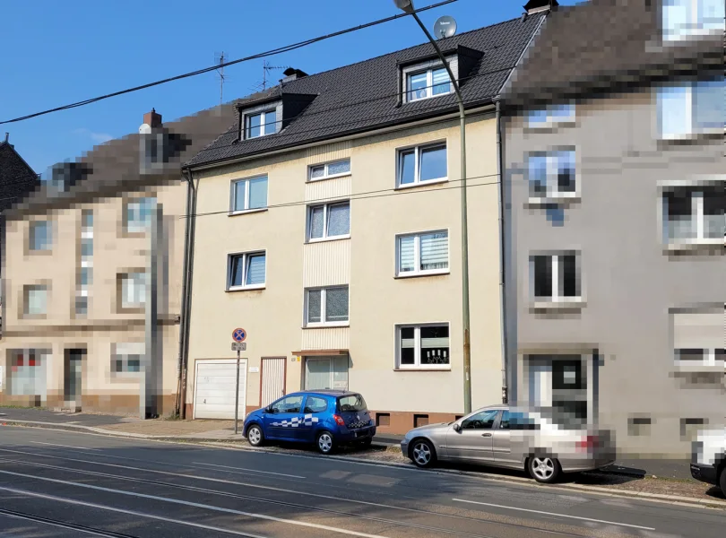 Vorderansicht - Haus kaufen in Essen - MANNELLA *Vermieten direkt am Park* Modernisiertes Mehrfamilienhaus fußläufig zum Bahnhof Borbeck-Süd