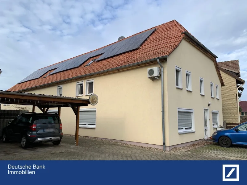 Straßenansicht - Haus kaufen in Grafhorst - Saniertes MFH mit 3 Wohneinheiten mit Photovoltaikanlage 