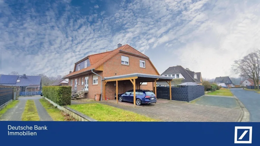 Straßenansicht - Haus kaufen in Wittingen - Moderne Doppelhaushälfte mit überdachter Terrasse und Garten