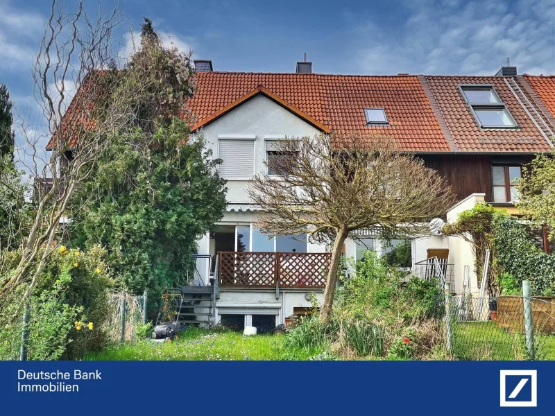Blick auf Terrasse - Haus kaufen in Wolfenbüttel - Ein Zuhause zum Verlieben – Modernisiertes Reihenmittelhaus mit eigenem Garten.
