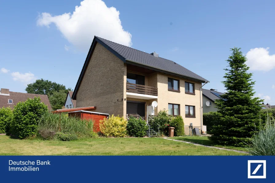 Hausansicht - Haus kaufen in Jembke - Vielseitiges Zweifamilienhaus in Jembke mit tollem Grundstück