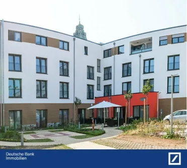 Rückansicht - Wohnung kaufen in Völklingen - Attraktive Investition in demografischen Wandel: Senioren-Appartement mit solider Rendite