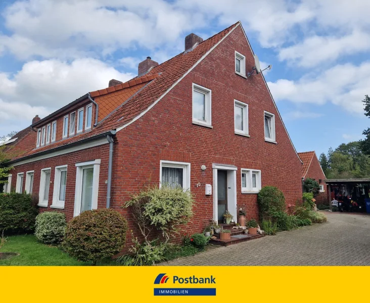 Seitenansicht - Haus kaufen in Wittmund - Doppelhaushälfte im Landkreis Wittmund!