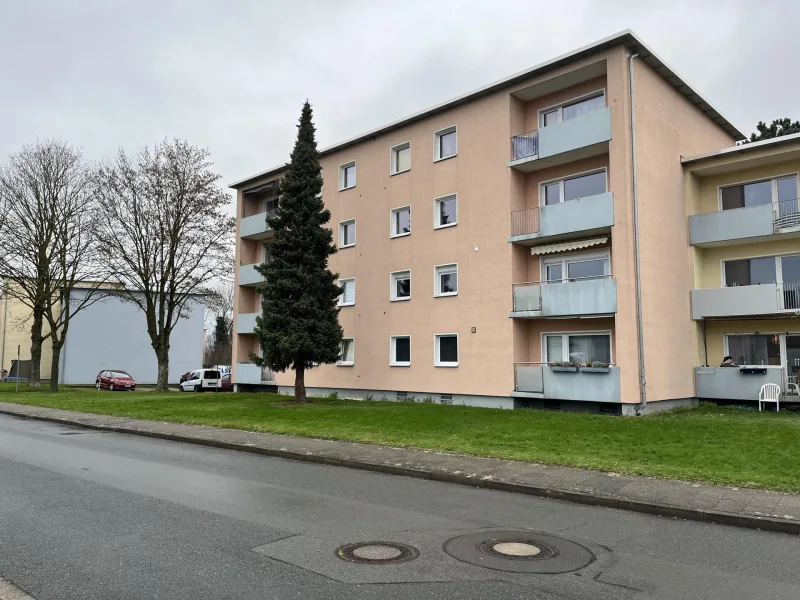 Außenansicht - Wohnung kaufen in Lotte - Familienfreundliche 4-Zimmer-Wohnung mit Süd-Balkon in beliebter Lage von Lotte