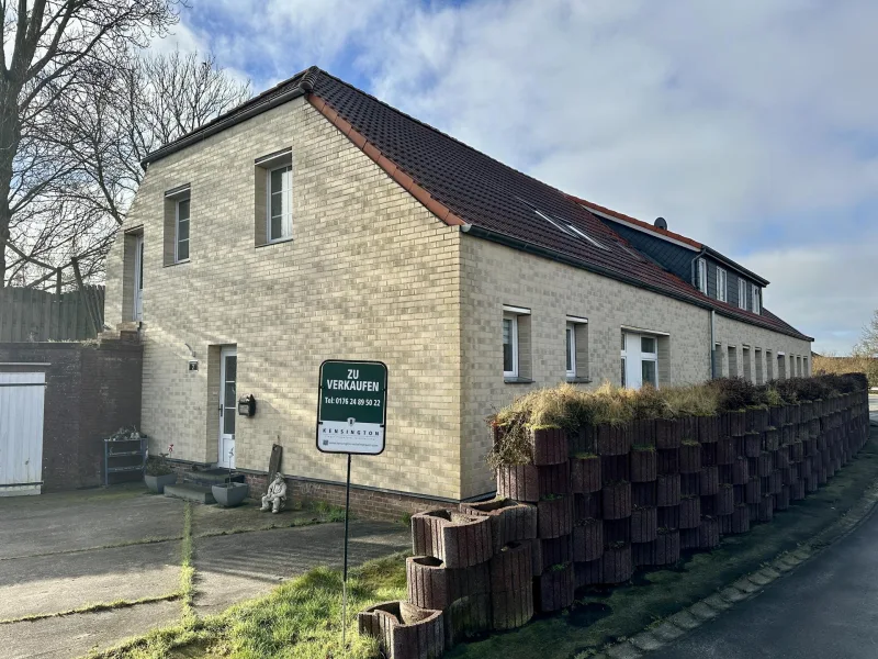 Außenansicht - Wohnung kaufen in Wangerland / Kaisershof - Sanierte Erdgeschosswohnung mit Terrasse – Ihr neues Zuhause - nahe der Küste