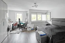 Elternschlafzimmer mit Schreibtischecke