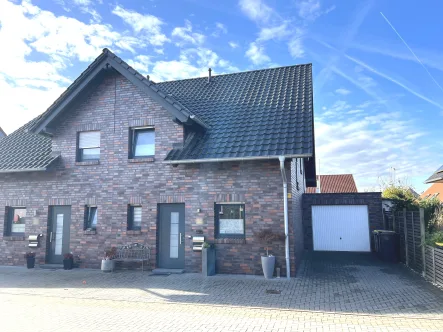 Ansicht 1 - Haus kaufen in Nordkirchen - Schöne Doppelhaushälfte in ruhiger Lage von Capelle!