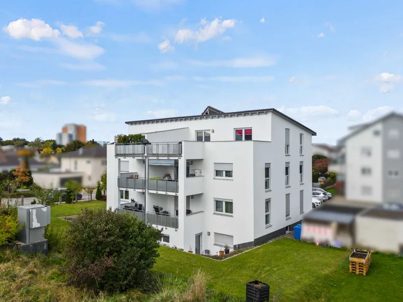 Außenansicht Osten - Wohnung kaufen in Laupheim - Stilvoll und zentrumsnah! Moderne 3,5-Zimmer-Wohnung mit Sonnenbalkon und gemütlichem Ambiente