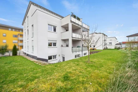 Außenansicht Garten - Wohnung kaufen in Laupheim - Stilvoll und zentrumsnah! Moderne 3,5-Zimmer-Wohnung mit Sonnenbalkon und gemütlichem Ambiente