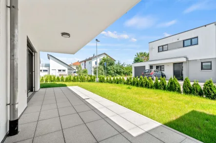 Terrasse - Wohnung kaufen in Schemmerhofen - Erstbezug! Hochwertige 4,5 Zimmer Eigentumswohnung mit eigenem Gartenanteil