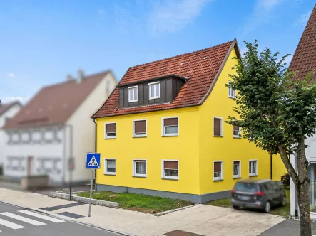 Außenansicht Nord-Ost - Wohnung kaufen in Laupheim - Attraktiv! Freundliche 4-Zimmer-Wohnung mit Sonnenbalkon in zentrumsnaher Wohnlage von Laupheim