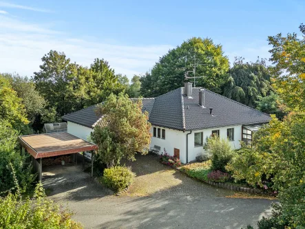 Ansicht Süd-West - Haus kaufen in Maselheim - Schnell sein lohnt sich! Einfamilienhaus im Bungalowstil mit großem Grundstück