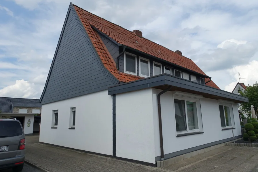 Aussen - Haus kaufen in Diepholz - *** Schöne DHH mit Einliegerwohnung -Garage und Garten in Diepholz zu verkaufen ***