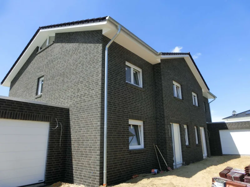  - Haus mieten in Wagenfeld - Neuwertige DHH mit Garage und Garten in Wagenfeld zu vermieten