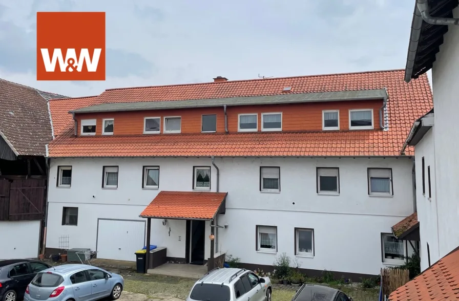 Außenansicht Wohnhaus Nr. 29 - Zinshaus/Renditeobjekt kaufen in Wölfersheim / Berstadt - Attraktives Anlageobjekt in 61200 Berstadt zu verkaufen: 10 Wohneinheiten + 10 Garagen