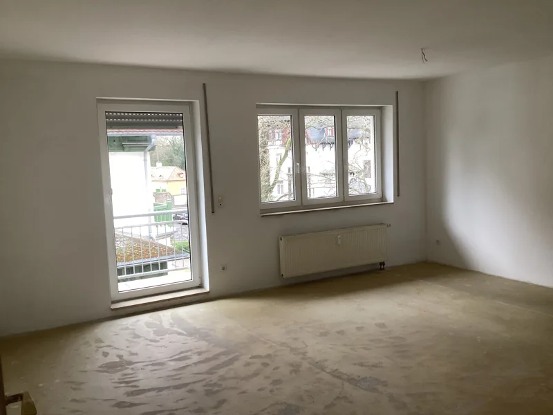 Wohnzimmer mit Balkon