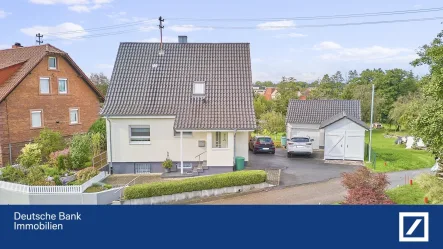 Oberansicht  - Haus kaufen in Buchen - Charmantes und gepflegtes Einfamilienhaus mit weitläufigem Garten