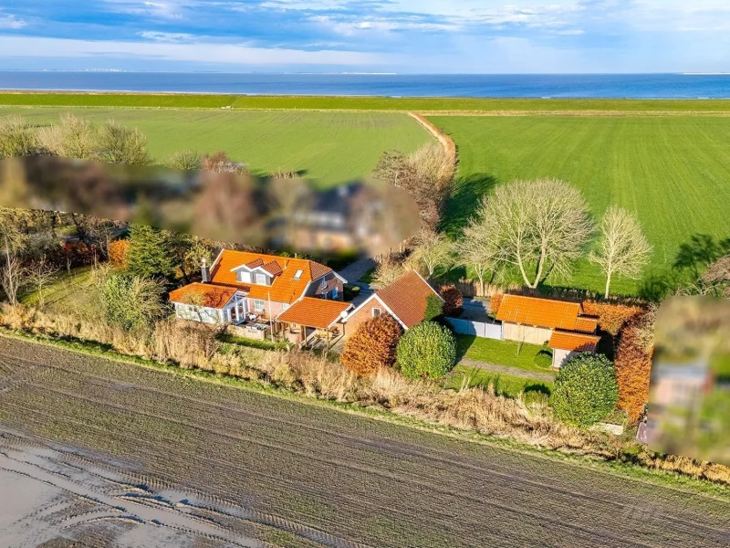  - Haus kaufen in Wangerland - Exklusives Wohnen an der Nordsee – Ihr Traumrefugium in Schillig