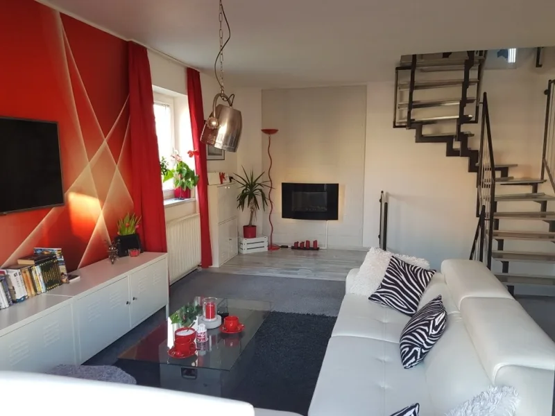 Wohnzimmer mit Balkon