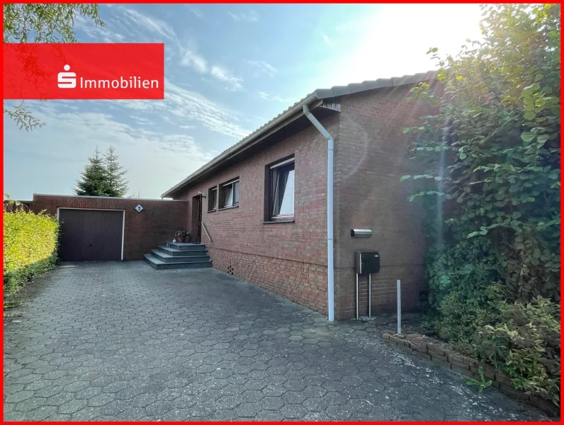 Ansicht - Haus kaufen in Diepholz - Familienidylle am Stadtrand von Diepholz: Bungalow mit unverbautem Weitblick!