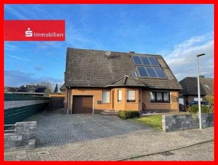 Strassenansicht - Haus kaufen in Wagenfeld - +++ Einmaliges Doppelhaus – Ideal als Mehrgenerationenwohnhaus +++