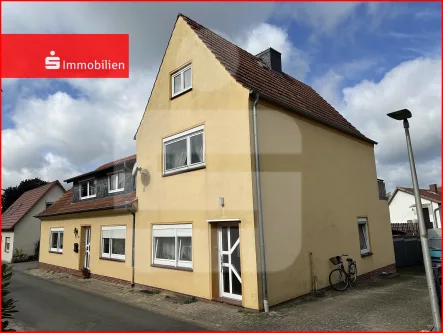 Straßenansicht 1 - Haus kaufen in Bassum - +++Zweifamilienhaus  in idyllischer Stadtlage+++