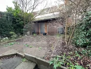 Souterrain mit Ausgang auf die Terrasse u. Tür in die Garage