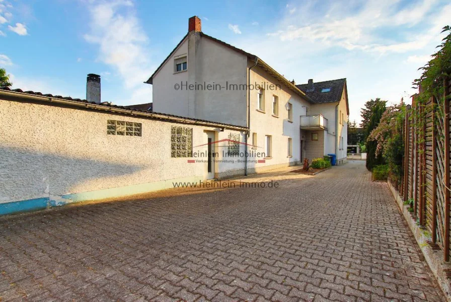  - Haus kaufen in Griesheim - gr. Innenhof. Einliegerwhg., Doppelgarage unterkellert Lagerfläche Garten - Griesheim Schülerstr.