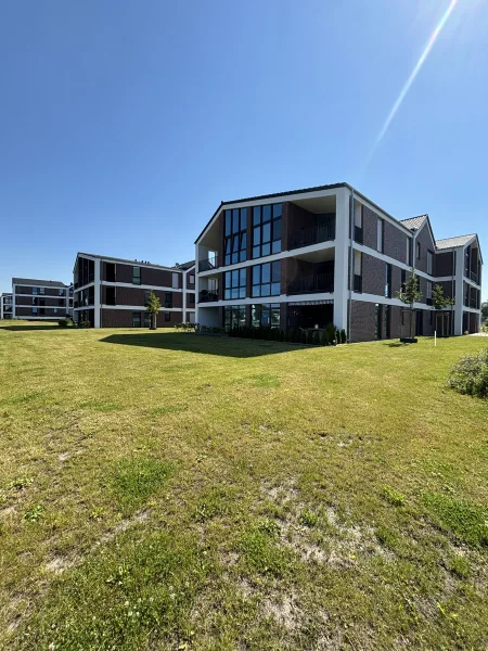 Haus 6 - Wohnung kaufen in Norden - Großzügige Erdgeschosswohnung mit sonniger Terrasse in Norden zu verkaufen!